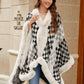 Cozy and stylish Bella Road Fuzzy Checkered Long Sleeve Poncho in black and white, perfect for fall fashion.