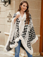 Cozy and stylish Bella Road Fuzzy Checkered Long Sleeve Poncho in black and white, perfect for fall fashion.