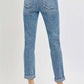 Back view of high rise cropped roll up jeans by Risen Jeans, showcasing stylish rolled-up cuffs and flattering fit, perfect with heels.