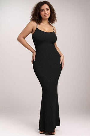 Woman wearing Basic Bae Built-In Shapewear Sleeveless Maxi Dress, showcasing a sleek silhouette and enhancing curves in a stylish black dress