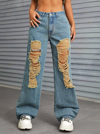 Woman wearing Bella Road Distressed Wide Leg Jeans with Pockets, showcasing stylish and edgy ripped design, perfect for making a bold fashion statement.