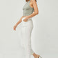 Model wearing RISEN Full Size High Waist Rolled Hem Straight Jeans in white with a casual green tank top and beige heels.