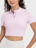 Millennia Quarter Zip Short Sleeve Active T-Shirt in light pink, perfect for workouts with a stylish and breathable design.