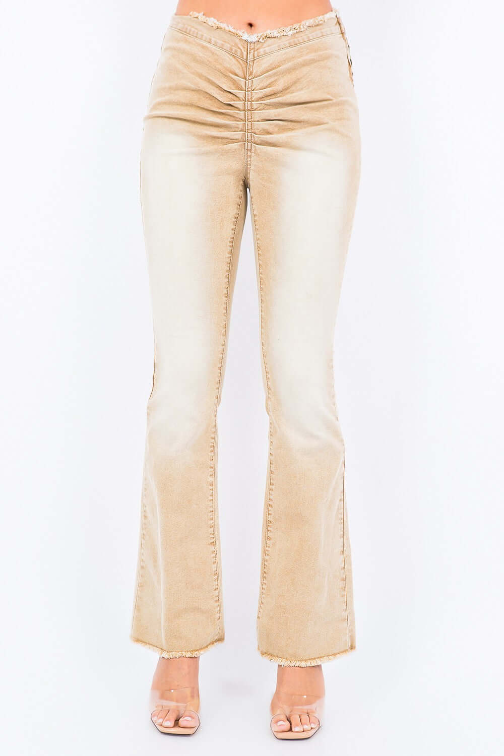 American Bazi V-cut ruched mid flare pants with side zipper closure and slim fit silhouette in beige color.