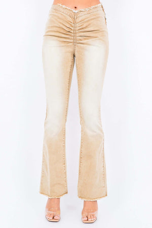 American Bazi V-cut ruched mid flare pants with side zipper closure and slim fit silhouette in beige color.