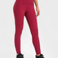 Millennia Highly Stretchy Wide Waistband Yoga Leggings in vibrant maroon, designed for ultimate comfort and flexibility. Perfect for yoga!