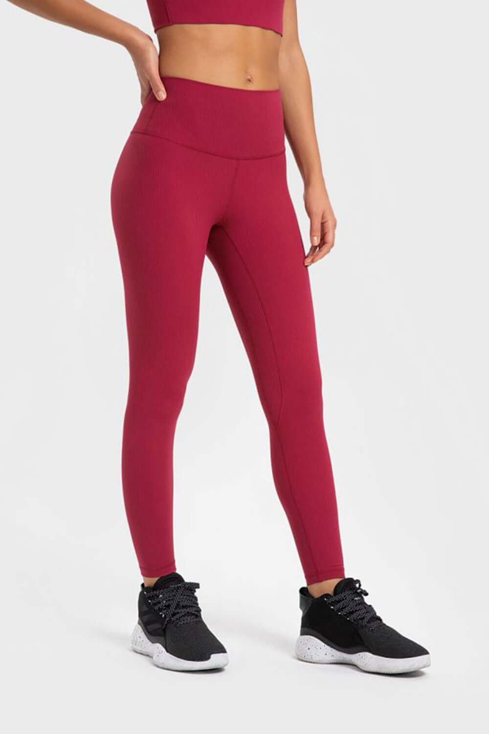 Millennia Highly Stretchy Wide Waistband Yoga Leggings in vibrant maroon, designed for ultimate comfort and flexibility. Perfect for yoga!