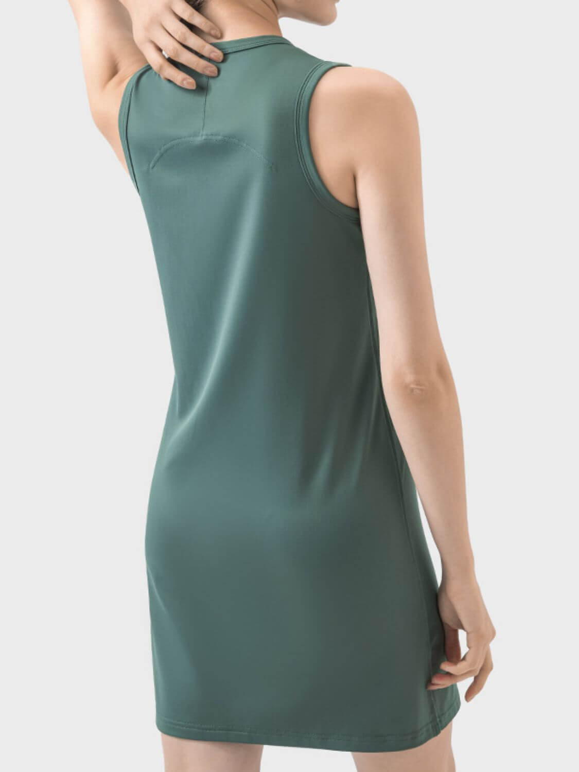 Back view of Millennia Round Neck Sleeveless Active Dress in green, showcasing sporty style and comfort for workouts.