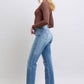 Model wearing Judy Blue vintage wash thermal straight jeans with pockets, styled in a cozy, casual outfit.