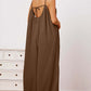 DOUBLE TAKE Full Size Ruffle Trim Tie Back Cami Jumpsuit with Pockets at Bella Road