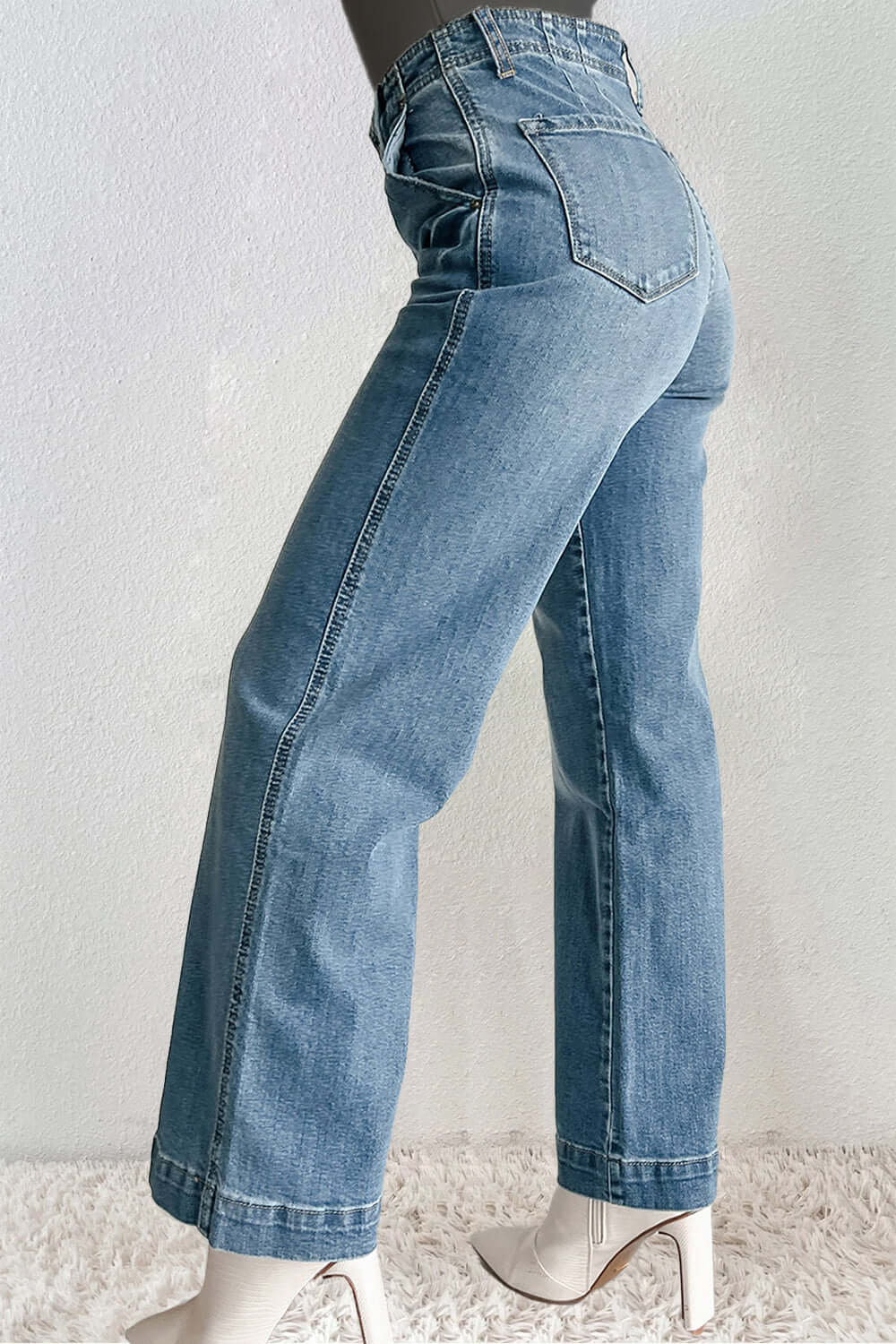 Petite straight jeans with pockets, buttoned design, blue denim, no stretch, rear view, styled with white heels