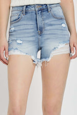 High rise distressed denim shorts by Risen Jeans, perfect for a trendy summer look with a flattering fit and edgy vibe