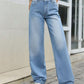 Stylish model wearing Bella Road Denim Mid Rise Wide Leg Jeans, showcasing unique wide leg design and mid rise fit.