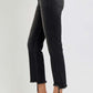 Side view of RISEN plus size raw hem cropped flare jeans, showcasing trendy black denim and stylish ankle length.