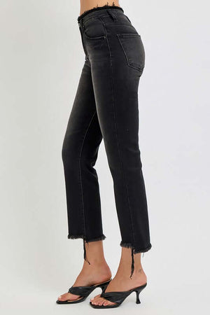 Side view of RISEN plus size raw hem cropped flare jeans, showcasing trendy black denim and stylish ankle length.