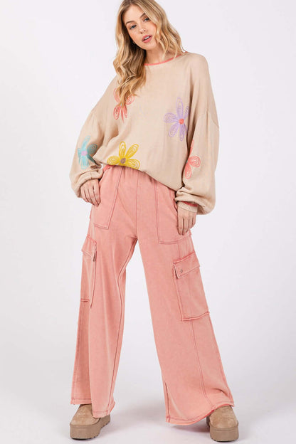 Woman wearing Knit Terry Mineral Wash Wide Leg Pants with a cozy sweater, showcasing a relaxed and trendy fashion-forward style.