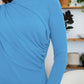 Blue ruched mock neck long sleeve t-shirt with a stylish fit, perfect for cozy fall fashion and layering.