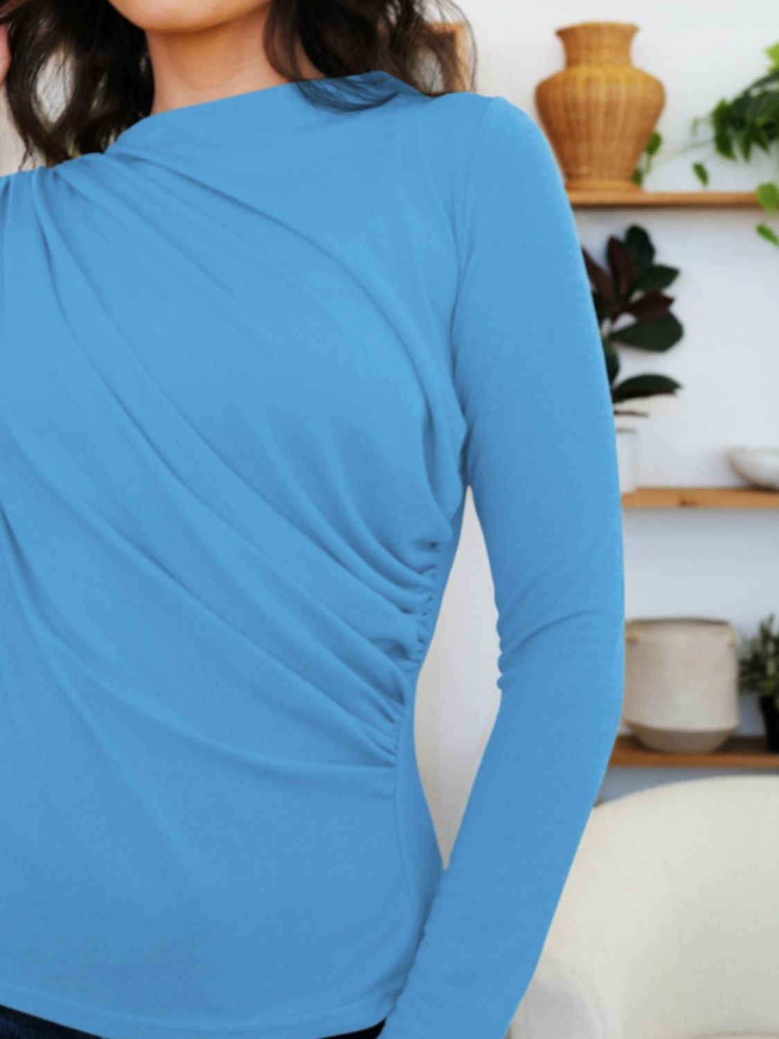 Blue ruched mock neck long sleeve t-shirt with a stylish fit, perfect for cozy fall fashion and layering.