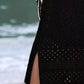 Semi-sheer black openwork cover up with side slit, perfect for stylish beach days and sunny adventures.