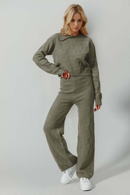 Woman wearing stylish checkered round neck top and pants set in green, perfect for edgy leisure wear with moderate stretch.