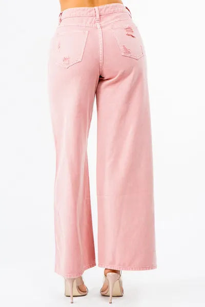 Back view of American Bazi high waist distressed wide leg jeans in pink, showcasing relaxed fit and stylish design.