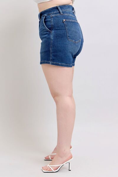 Judy Blue plus size denim shorts with double button waistband, showcasing a side view for style and comfort.