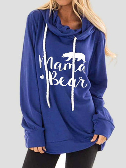 Woman wearing Bella Road Drawstring Letter Graphic Long Sleeve Hoodie with "Mama Bear" print, in blue.