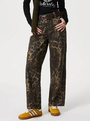 Bella Road Denim Leopard Straight Jeans featuring bold leopard print and functional pockets, styled with a trendy outfit.