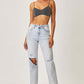 High Rise Distressed Relaxed Jeans | Petite featuring trendy Risen Jeans with flattering high-rise waist and edgy distressed details.