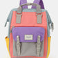 Colorful Himawari Buttercup backpack with handles, featuring a boxy shape, padded straps, and durable nylon fabric perfect for laptops.