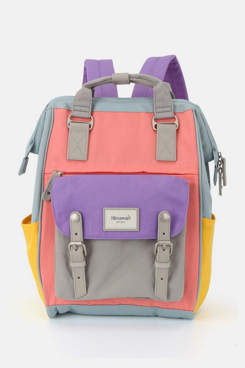 Colorful Himawari Buttercup backpack with handles, featuring a boxy shape, padded straps, and durable nylon fabric perfect for laptops.