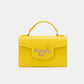 Nicole Lee USA small yellow crossbody wallet with handle made of vegan leather.