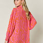 DOUBLE TAKE Full Size Printed Smocked Long Sleeve Blouse at Bella Road