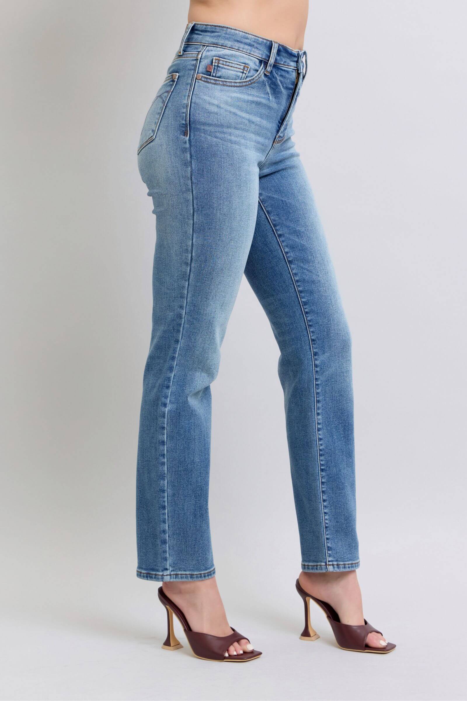 Side view of Judy Blue vintage wash thermal straight jeans, showcasing a classic silhouette and stylish fit.