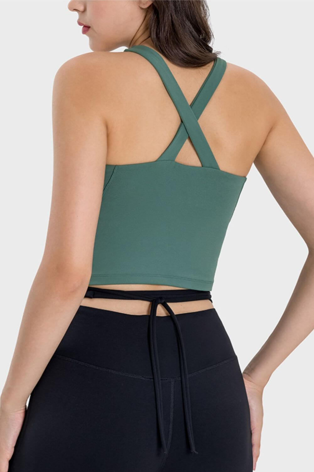 Stylish back view of Millennia Crisscross Grecian Neck Active Cami in green, featuring a unique crisscross design for gym wear.