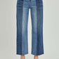 Mid-Rise Waist Two-Tones Risen Jeans with pockets, showcasing a unique dual-tone design, perfect for casual daily wear, paired with sandals.