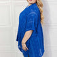 JUSTIN TAYLOR Pom-Pom Asymmetrical Poncho Cardigan in Blue at Bella Road