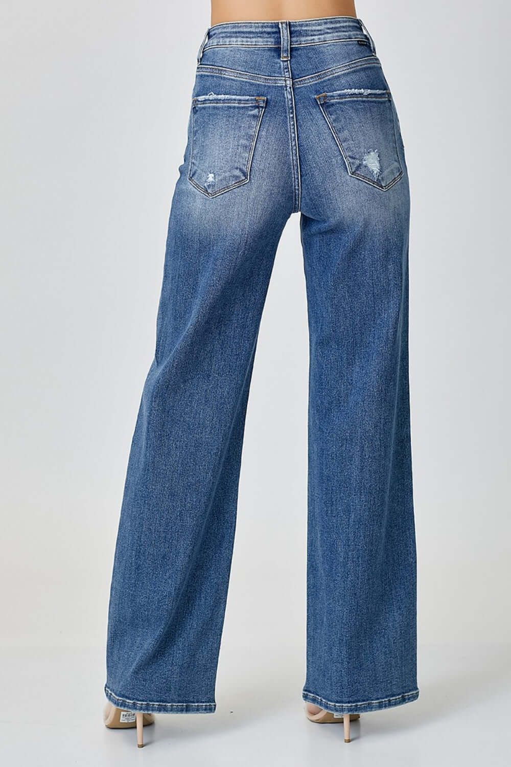 High Waist Wide Leg Risen Jeans in denim, back view showcasing the trendy wide-leg silhouette and stylish high-rise waist.