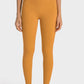 Millennia High-Rise Wide Waistband Yoga Leggings in mustard color, showcasing a sleek, comfortable fit for yoga practice.