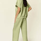 DOUBLE TAKE Full Size Texture Half Zip Short Sleeve Top and Pants Set at Bella Road