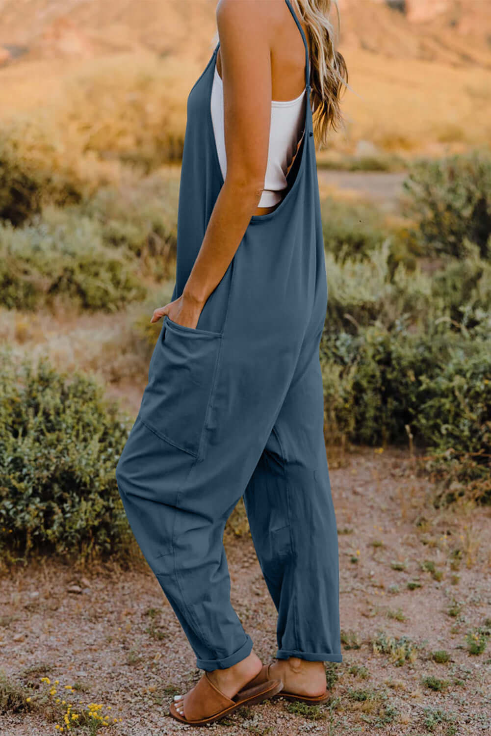 DOUBLE TAKE Full Size V-Neck Sleeveless Jumpsuit with Pockets at Bella Road