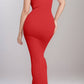 Woman wearing a red Basic Bae Built-In Shapewear Sleeveless Maxi Dress, highlighting curves and sleek silhouette from the back.