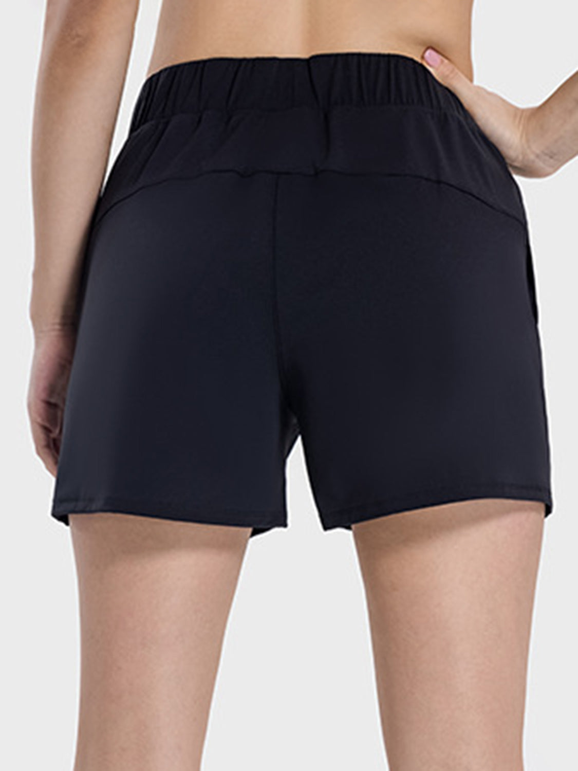 Back view of Millennia Elastic Waist Active Shorts showcasing the comfortable waistband and sleek design.