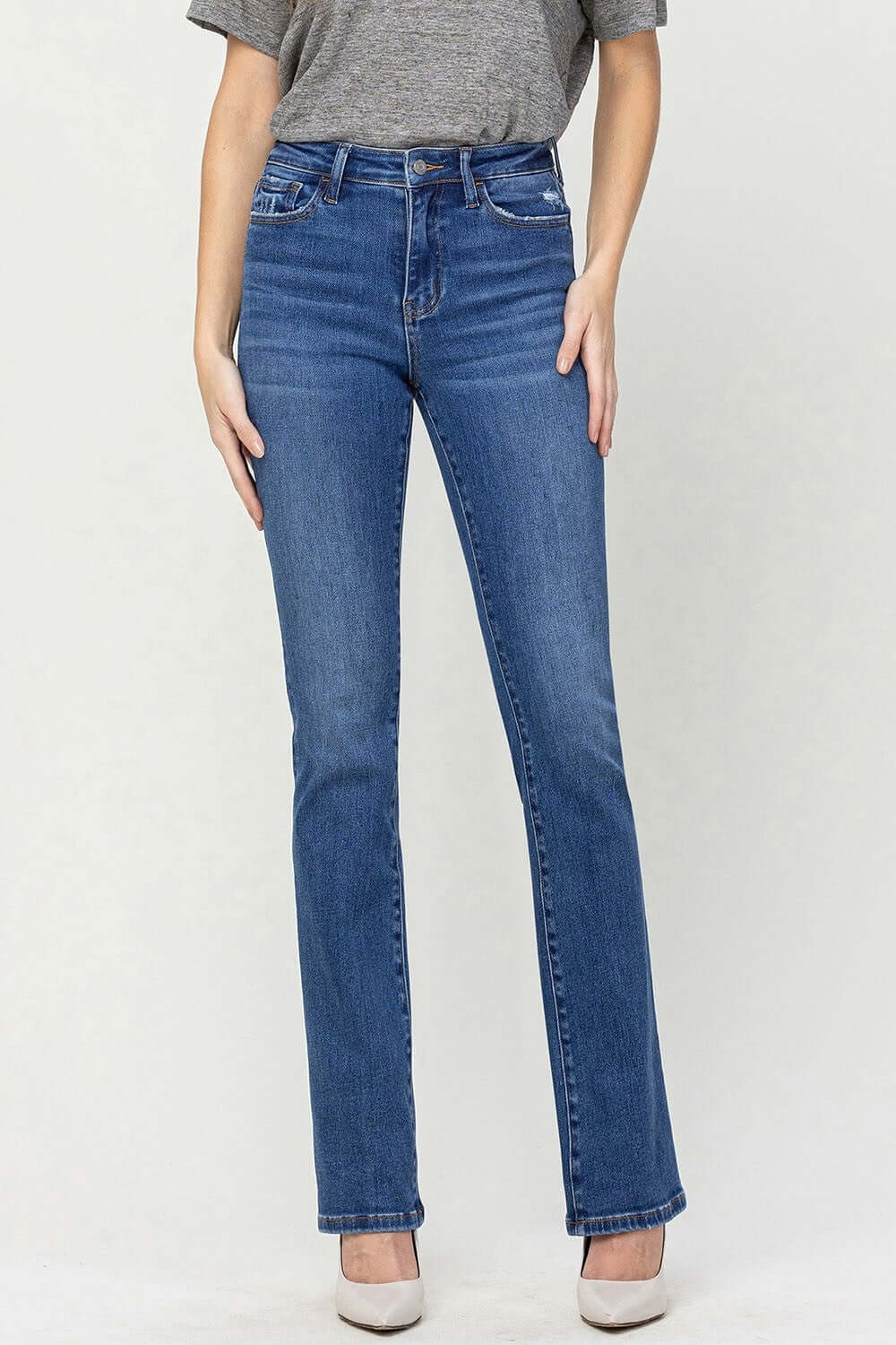 High Waist Bootcut Jeans in blue denim, offering a slimming effect and elongating your legs for a timeless and sophisticated look.