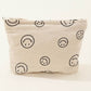 Stylish Zenana Corduroy Smile Clutch Bag featuring a cute smiley face print, perfect for casual and semi-formal occasions.