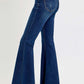 RISEN Tummy Control High Rise Flare Jeans with Frayed Hem and Belt for women, showcasing flattering fit and retro-inspired look