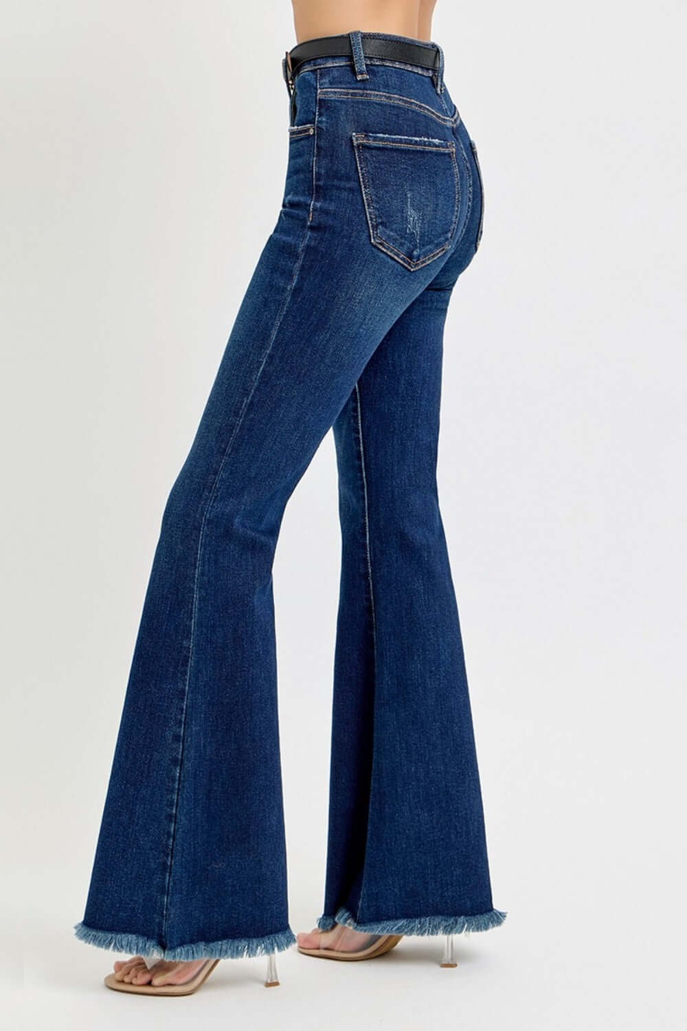 RISEN Tummy Control High Rise Flare Jeans with Frayed Hem and Belt for women, showcasing flattering fit and retro-inspired look