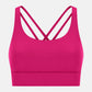 Bright pink Millennia crisscross scoop neck active tank with stylish straps for optimal comfort and breathability.