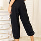 DOUBLE TAKE Decorative Button Cropped Pants at Bella Road