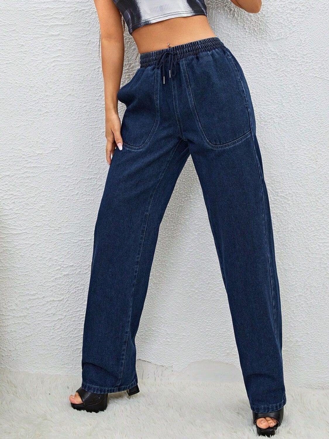 Woman wearing Bella Road Drawstring Elastic Waist Jeans with Pockets, showcasing comfortable fit and stylish design